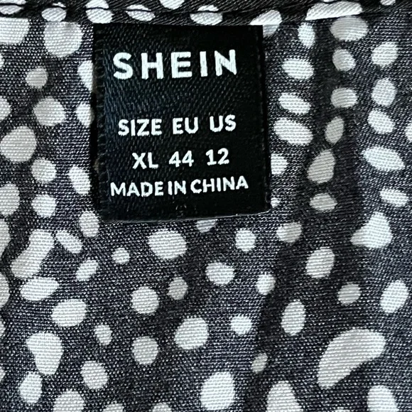 SHEIN Black and White Butterfly Sleeve Polka Dot Romper - Picture 9 of 11